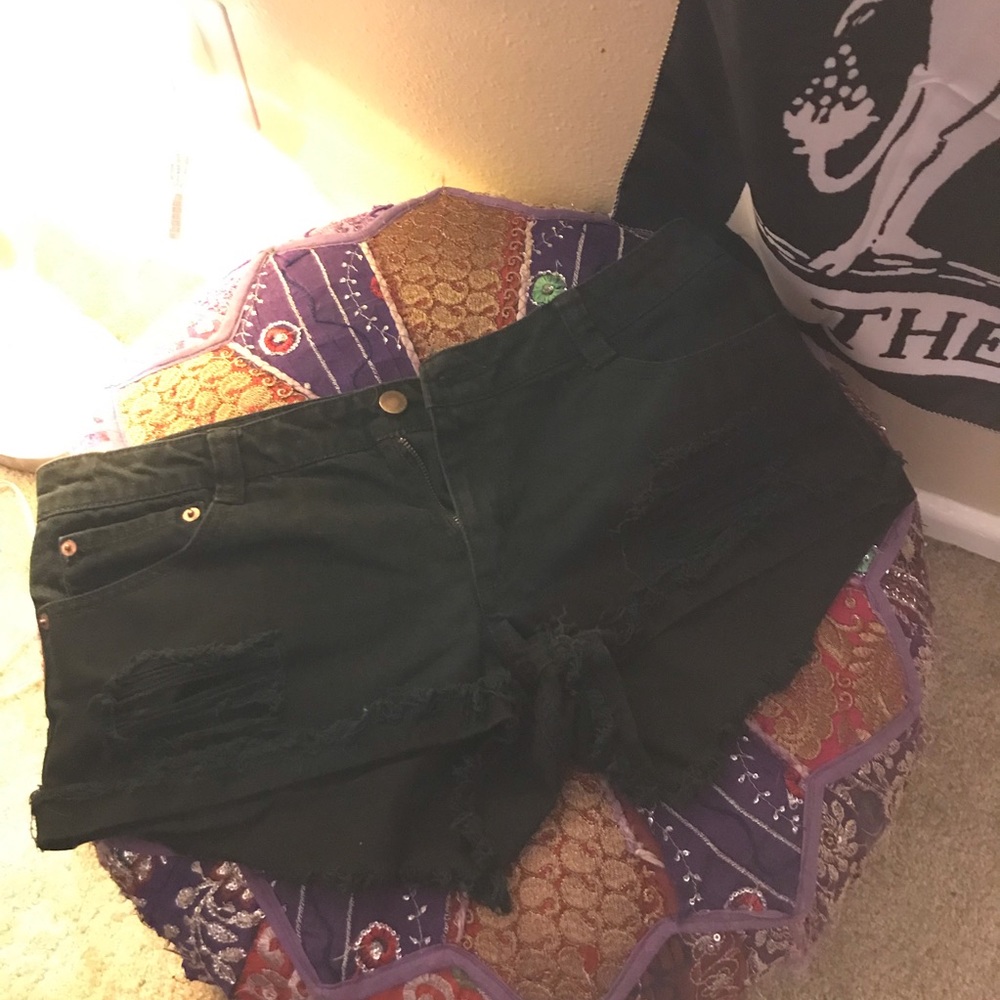 Black ripped shorts